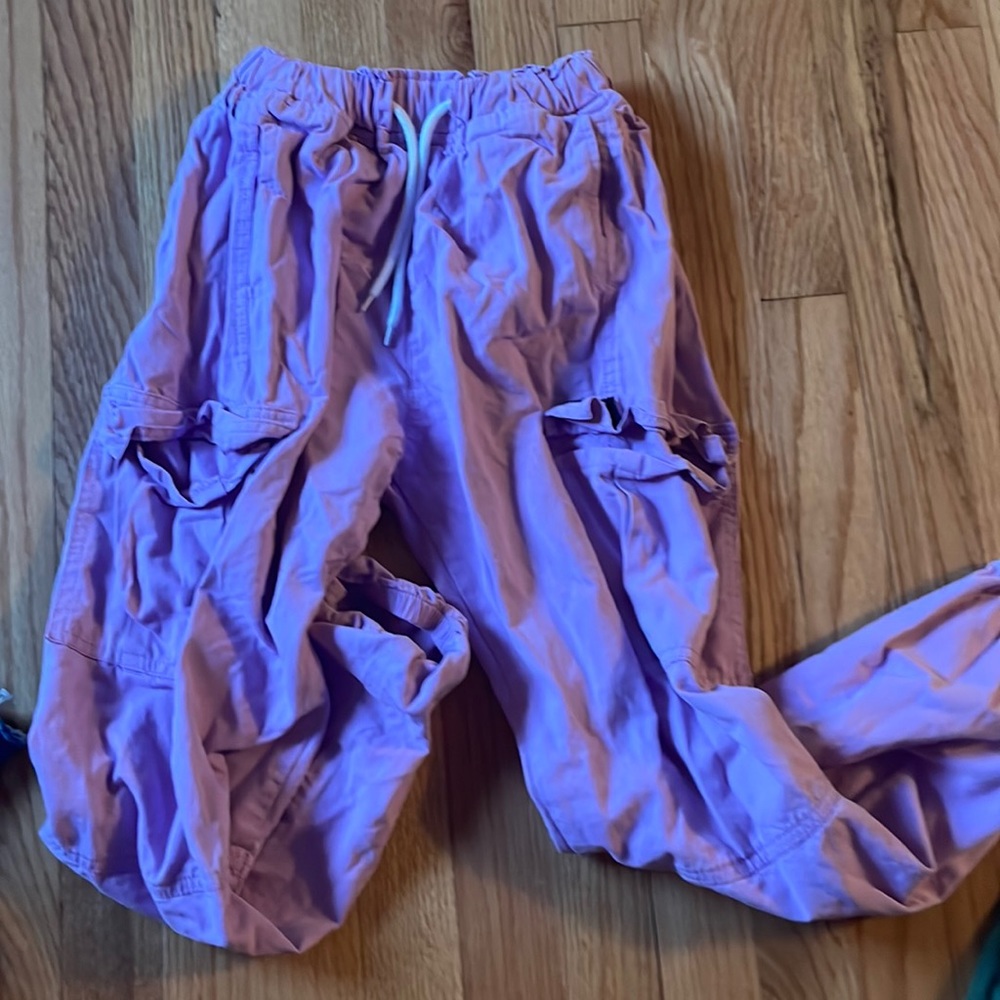 these are purple cargo pants with four pockets.